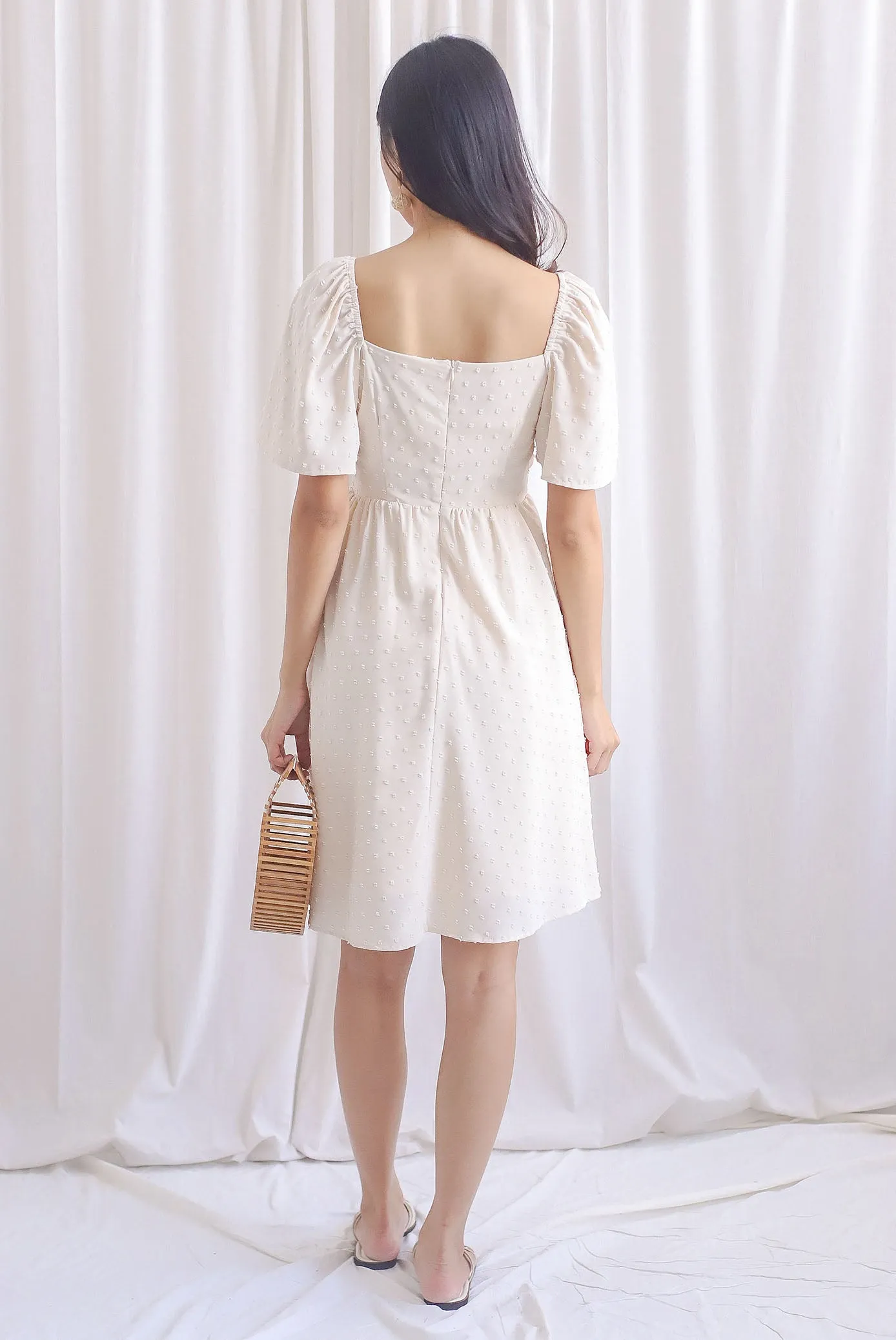 Elly Swiss Dot Flutter Sleeve Dress In Cream