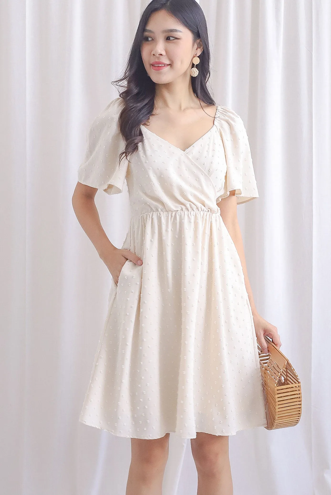 Elly Swiss Dot Flutter Sleeve Dress In Cream