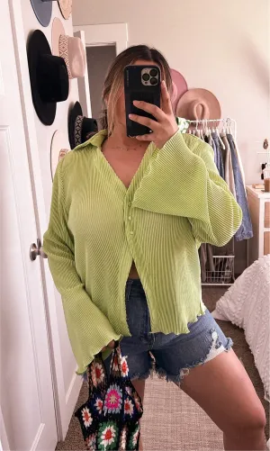 ojitos lindos pleaded bell sleeve top