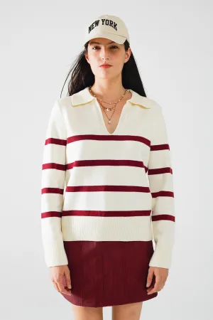 white sweater with dark red stripes and wide v neck